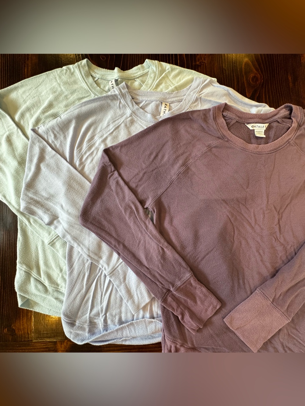 THREE medium Athleta light sweatshirts